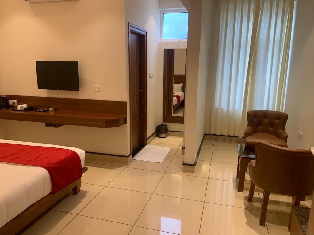 Jesta Residency Hotel Hassan Exterior photo